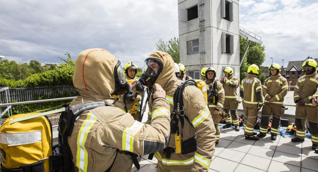 Babcock firefighter training donning breathing apparatus